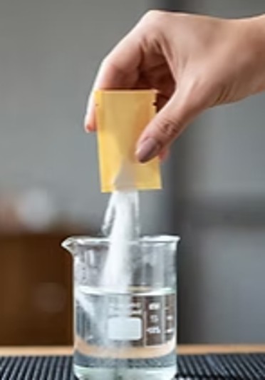Powder reagent poured into water